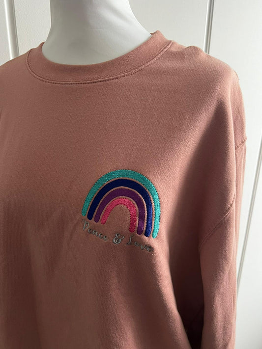 Sweatshirt mit Regenbogen Stick